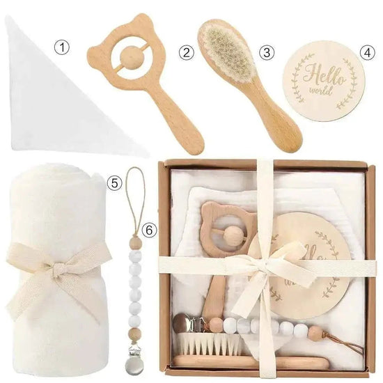 Newborn Gift Set Bath Towel Pacifier & Toys including towel, pacifier, brush, and toys for baby care.