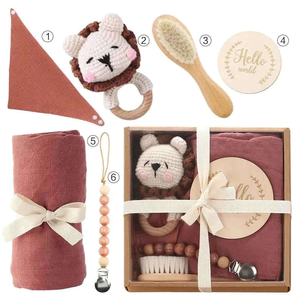 Newborn Gift Set Bath Towel Pacifier & Toys featuring adorable lion toy, towel, brush, teether, and more.