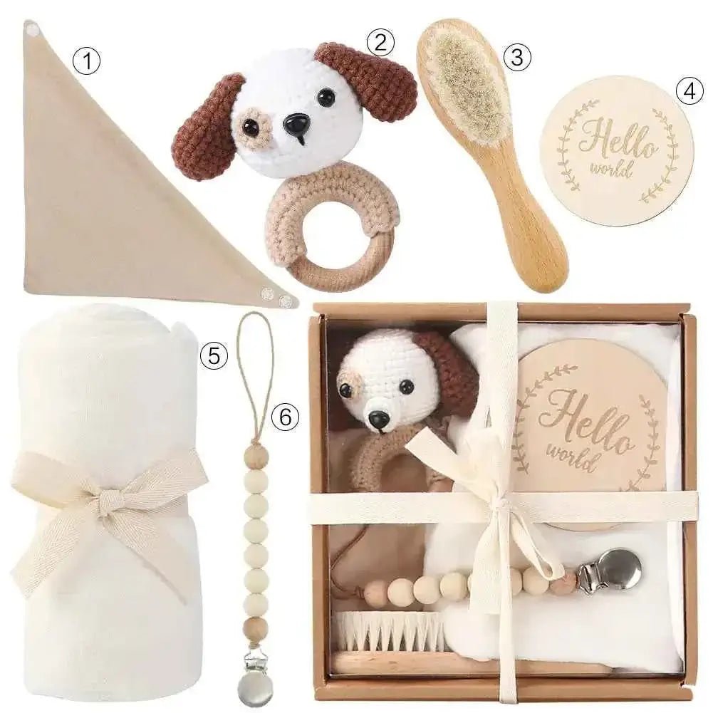 Newborn Gift Set Bath Towel Pacifier & Toys featuring towel, pacifier, teething ring, brush, and wooden tag.
