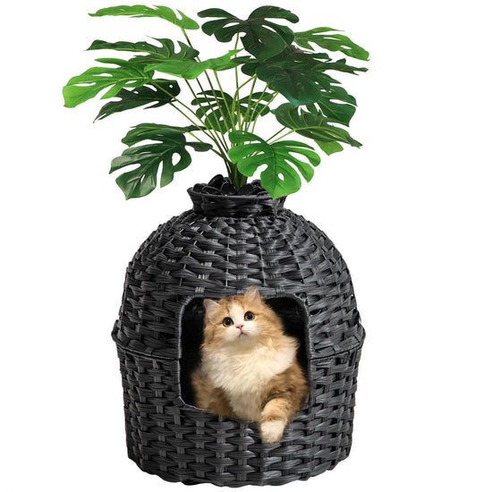 Cat Litter Box Plant Furniture Hidden Cat Litter Box w Artificial Plants with a cat sitting inside.